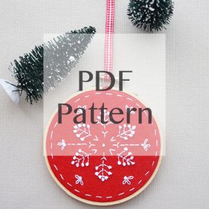 ornate snowflake embroidery in a hoop
